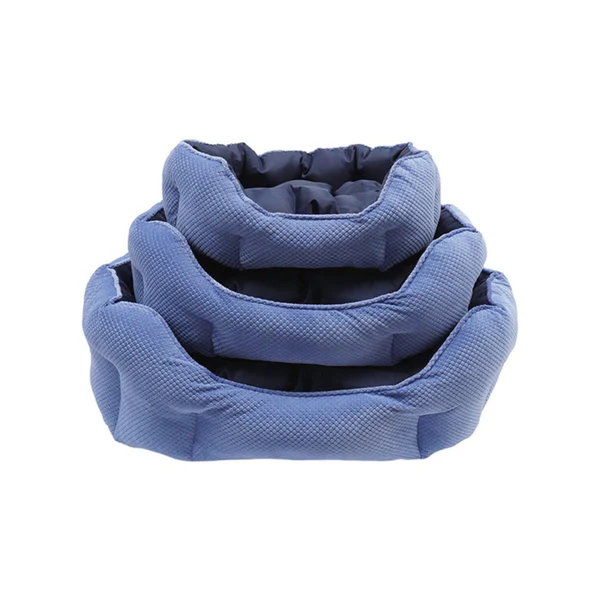 QUILTED NAVY WATER RESISTANT BED